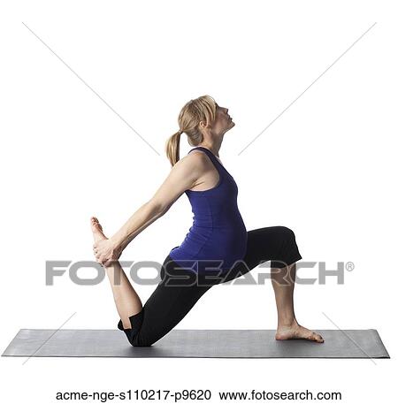 Young pregnant woman practicing yoga, studio shot View Large Photo Image Stock Image - Young pregnant woman practicing yoga, studio shot. Fotosearch