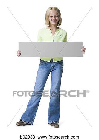 Stock Photo - One young girl holding a blank sign. Fotosearch