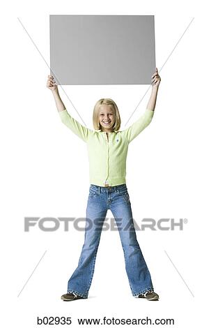 One young girl holding a blank sign View Large Photo Image Stock Photography - One young girl holding a blank sign. Fotosearch