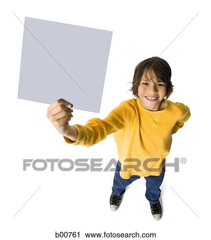 Portrait of a boy holding a placard View Large Photo Image Stock Image - Portrait of a boy holding a placard. Fotosearch