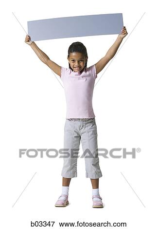 Stock Photo - Portrait of a girl holding a blank sign. Fotosearch