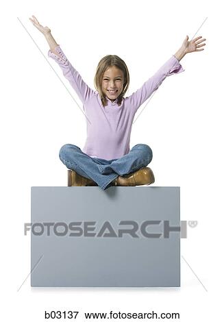Stock Photo - Portrait of a girl sitting on a blank sign. Fotosearch