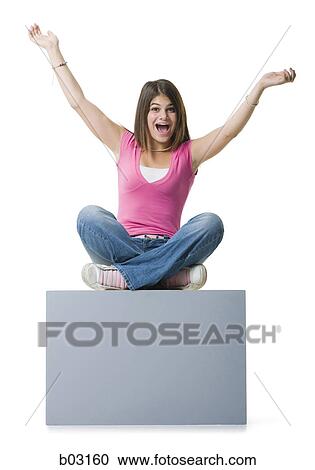Portrait of a teenage girl sitting on a blank sign View Large Photo Image Stock Image - Portrait of a teenage girl sitting on a blank sign. Fotosearch