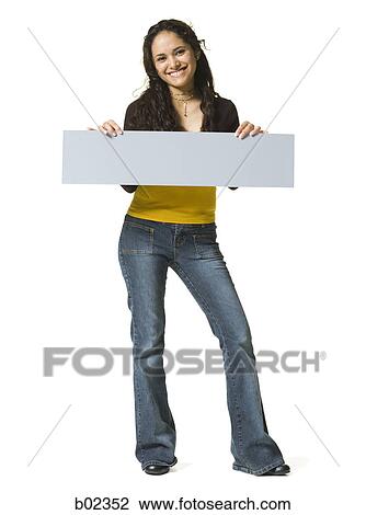 Portrait of a young woman holding a blank sign View Large Photo Image Stock Image - Portrait of a young woman holding a blank sign. Fotosearch