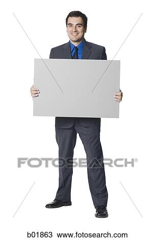 Stock Image - Businessman holding a blank sign. Fotosearch
