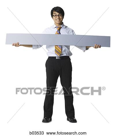 Close-up of a young woman operating a personal organizer View Large Photo Image Stock Image - Close-up of a young woman operating a personal organizer. Fotosearch