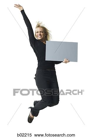 Portrait of a young woman holding a blank sign View Large Photo Image Stock Photography - Portrait of a young woman holding a blank sign. Fotosearch