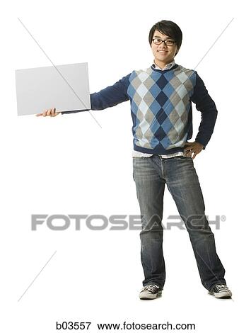 Portrait of a young woman smiling View Large Photo Image Stock Photo - Portrait of a young woman smiling. Fotosearch