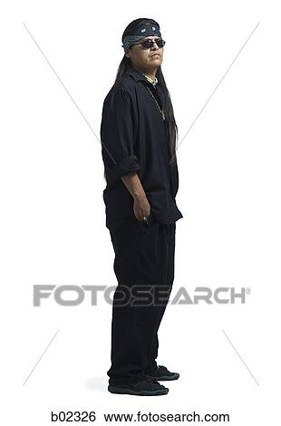 Mature man standing with his hands in his pocket View Large Photo Image Stock Photograph - Mature man standing with his hands in his pocket. Fotosearch