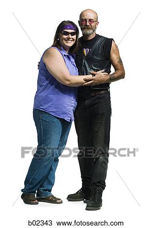 Portrait of a mature couple standing View Large Photo Image Stock Image - Portrait of a mature couple standing. Fotosearch