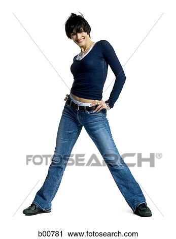 Portrait of a mid adult woman standing with arms akimbo View Large Photo Image Stock Image - Portrait of a mid adult woman standing with arms akimbo. Fotosearch