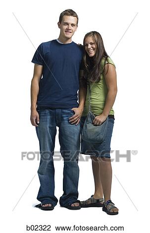 Stock Image - Portrait of a young couple standing. Fotosearch