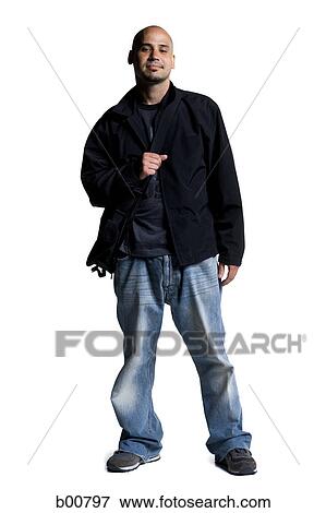 Portrait of a young man carrying a bag View Large Photo Image Stock Photo - Portrait of a young man carrying a bag. Fotosearch