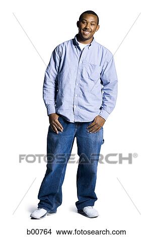 Portrait of a young man smiling View Large Photo Image Picture - Portrait of a young man smiling. Fotosearch