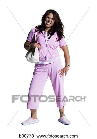 Stock Photo - Portrait of a young woman and three young men standing together. Fotosearch