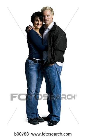 Side profile of a mid adult couple embracing View Large Photo Image Stock Image - Side profile of a mid adult couple embracing. Fotosearch