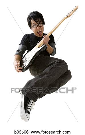 Stock Photograph - High angle view of a young woman smiling. Fotosearch