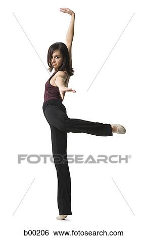 Portrait of a young woman dancing View Large Photo Image Stock Photograph - Portrait of a young woman dancing. Fotosearch