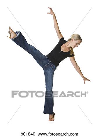 Young woman dancing View Large Photo Image Stock Image - Young woman dancing. Fotosearch