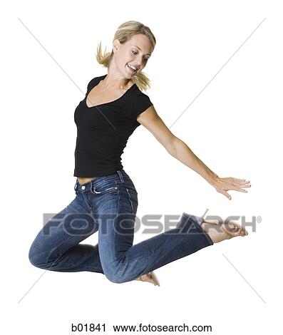 Young woman jumping View Large Photo Image Stock Image - Young woman jumping. Fotosearch