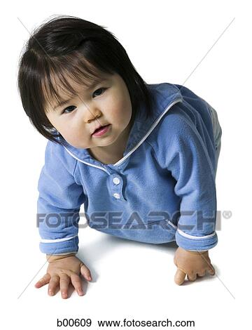 Portrait of a baby girl crawling View Large Photo Image Stock Photo - Portrait of a baby girl crawling. Fotosearch