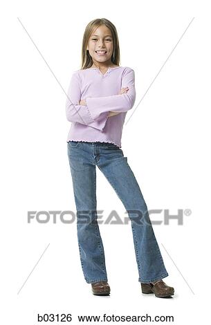 Stock Photograph - Portrait of a girl standing with her arms crossed. Fotosearch