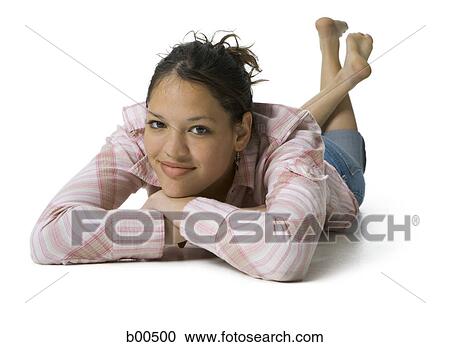 Portrait of a teenage girl resting her chin on her hand View Large Photo Image Stock Image - Portrait of a teenage girl resting her chin on her hand. Fotosearch