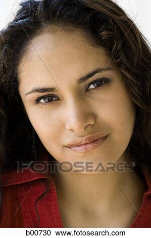 Stock Image - Portrait of a teenage girl smiling. Fotosearch