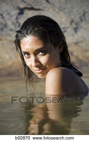 Portrait of a young woman in a lake View Large Photo Image Stock Image - Portrait of a young woman in a lake. Fotosearch