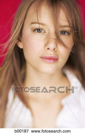 Portrait of a young woman posing View Large Photo Image Stock Photo - Portrait of a young woman posing. Fotosearch