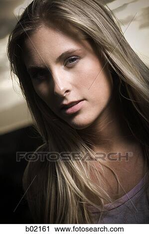 Stock Image - Portrait of a young woman. Fotosearch