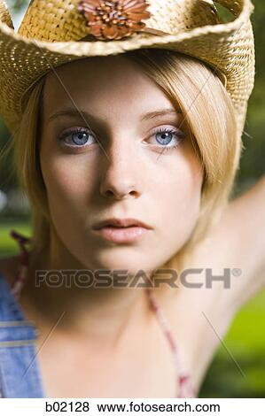 Portrait of a young woman View Large Photo Image Stock Photo - Portrait of a young woman. Fotosearch