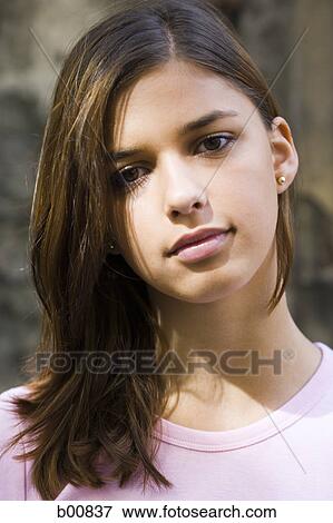 Portrait of a young woman thinking View Large Photo Image Stock Photo - Portrait of a young woman thinking. Fotosearch