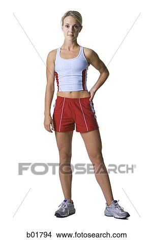 Portrait of a young woman in sports clothing View Large Photo Image Picture - Portrait of a young woman in sports clothing. Fotosearch