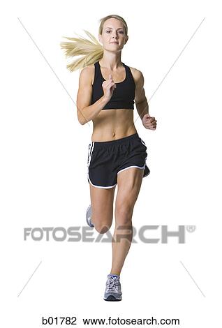 Portrait of a young woman jogging View Large Photo Image Stock Image - Portrait of a young woman jogging. Fotosearch