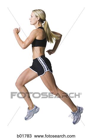 Profile of a young woman jogging View Large Photo Image Stock Image - Profile of a young woman jogging. Fotosearch
