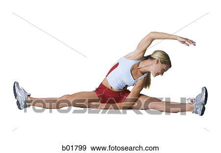 Stock Photo - Young woman exercising. Fotosearch