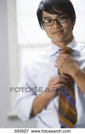 Portrait of a man giving a thumbs up View Large Photo Image Stock Photo - Portrait of a man giving a thumbs up. Fotosearch