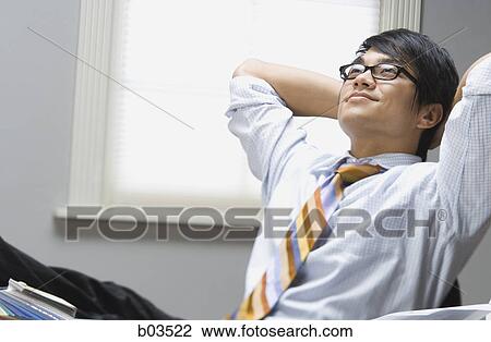 Portrait of a young woman flexing muscles View Large Photo Image Stock Image - Portrait of a young woman flexing muscles. Fotosearch