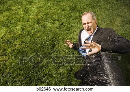 High angle view of a businessman View Large Photo Image Stock Photograph - High angle view of a businessman. Fotosearch