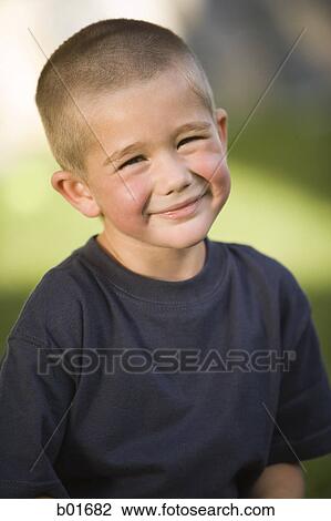Stock Image - Portrait of a boy smiling. Fotosearch