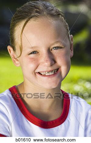 Portrait of a girl smiling View Large Photo Image Stock Image - Portrait of a girl smiling. Fotosearch