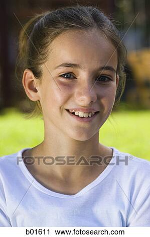 Portrait of a girl smiling View Large Photo Image Stock Image - Portrait of a girl smiling. Fotosearch