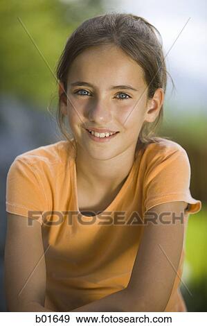 Portrait of a girl smiling View Large Photo Image Stock Photo - Portrait of a girl smiling. Fotosearch