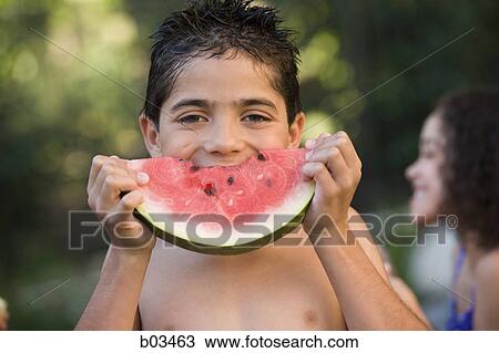 Close-up of a father with his son and daughter smiling View Large Photo Image Stock Image - Close-up of a father with his son and daughter smiling. Fotosearch