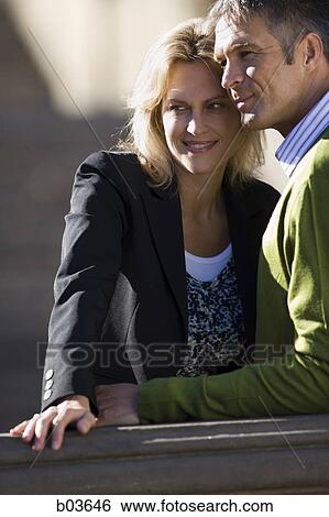 Stock Photograph - Low angle view of a young man jumping. Fotosearch