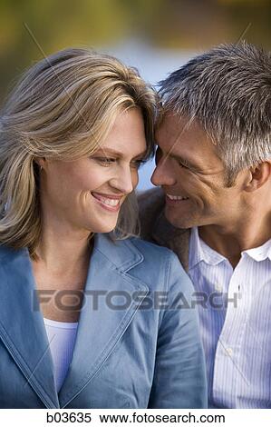 Stock Photography - Portrait of a young woman smiling. Fotosearch