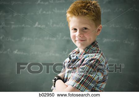 A young boy happy at school View Large Photo Image Stock Image - A young boy happy at school. Fotosearch