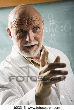 Close-up of a male scientist gesturing View Large Photo Image Stock Photograph - Close-up of a male scientist gesturing. Fotosearch