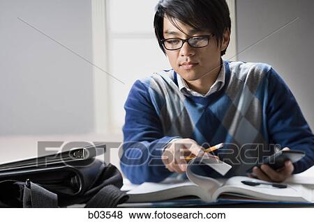 High angle view of a young woman sleeping View Large Photo Image Stock Photo - High angle view of a young woman sleeping. Fotosearch
